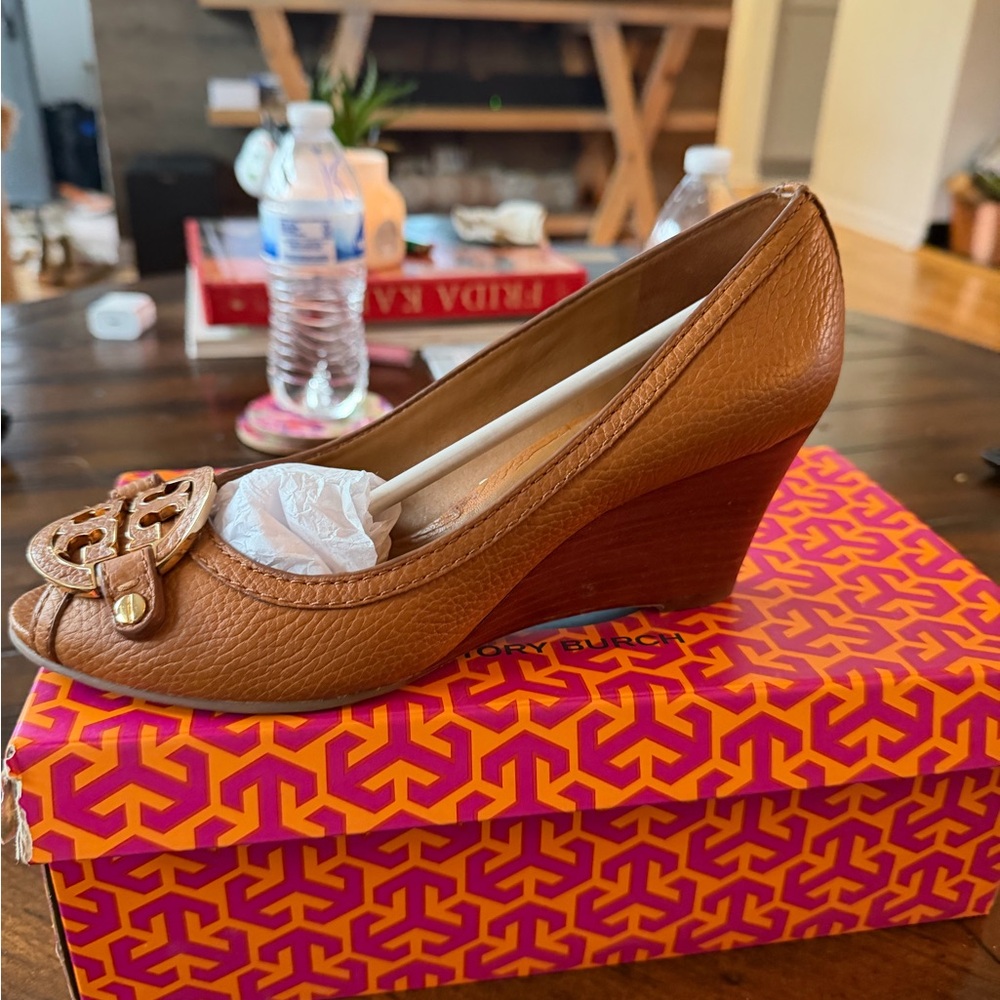 Tory Burch Brown Pebbled Leather Wedge Pumps with Gold Emblem